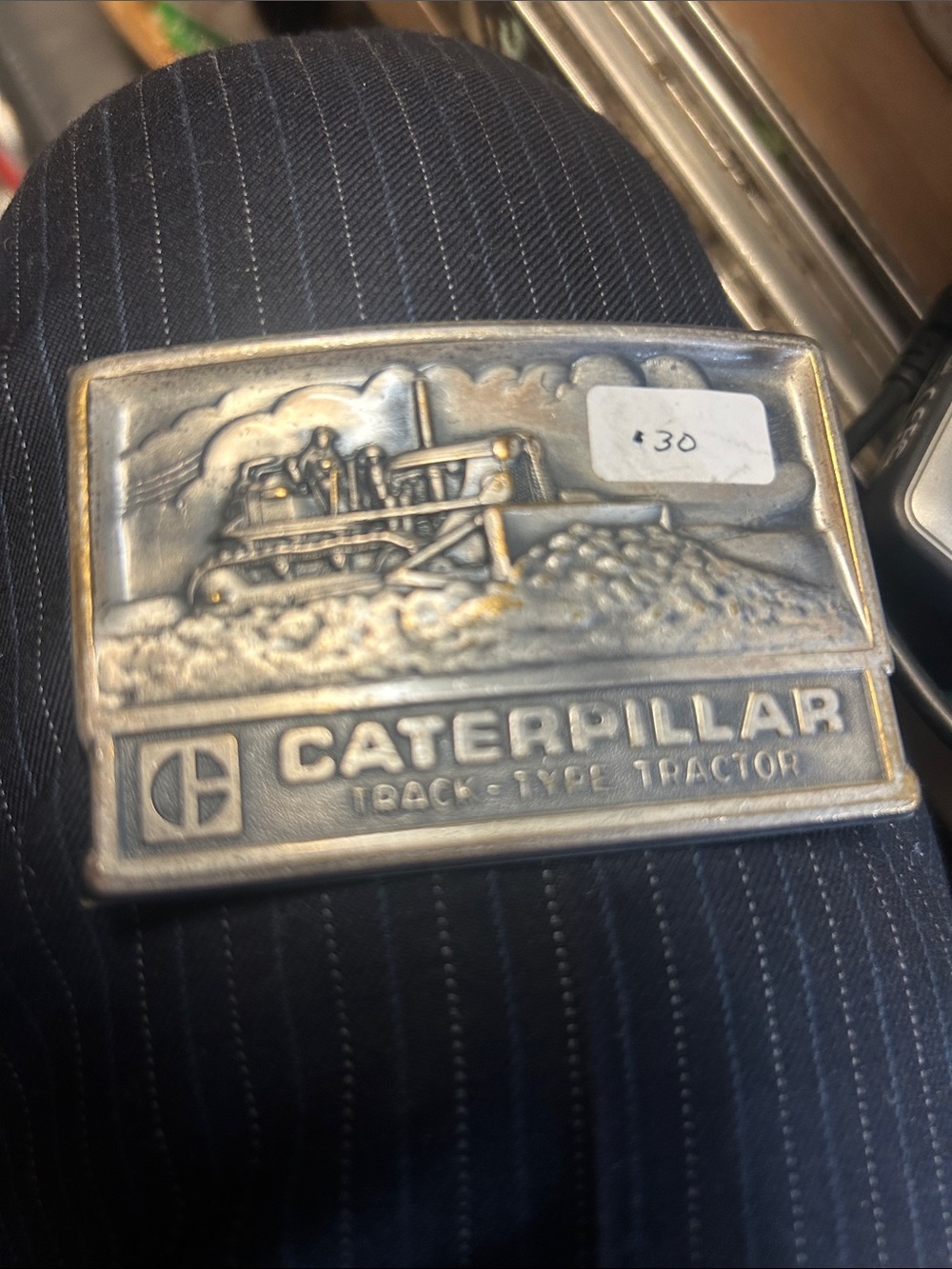 Caterpillar Silver-Tone Embossed Tractor Belt Buckle